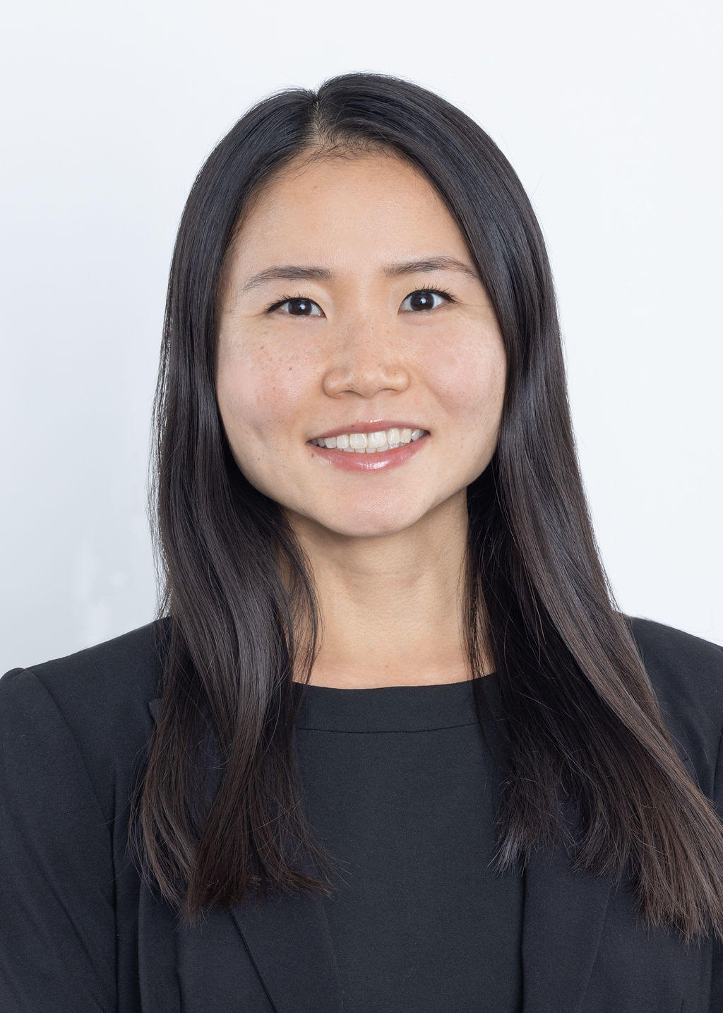 Professional headshot of Athena Cave